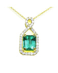Emerald pendant necklace halo diamond with gold chain on a white background