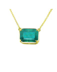 Colombian emerald solitaire necklace sourced from the Muzo mine, set in a handcrafted 18k yellow gold frame