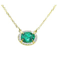 Emerald necklace oval cut east west orientation from Muzo mines Colombia halo natural diamonds