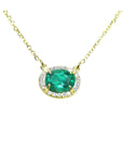 Emerald necklace oval cut east west orientation from Muzo mines Colombia halo natural diamonds