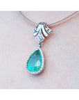 Women's emerald enhancer necklace pear cut emerald 6.01 carats encircle by a halo of natural diamonds