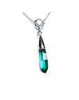 frontal view of a emerald and diamond briolette necklace in 14k white gold with a natural diamond