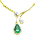 Colombian emerald gold necklace deep green hue teardrop pendant halo diamond.