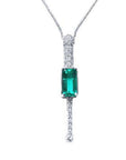 Women's 14K white gold necklace with a rectangular Colombian emerald and diamond accents.