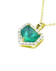 Gold necklace with a genuine emerald pendant on a toside and gallery view.