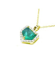 1.75 ct Colombian emerald pendant with diamond halo on a 14K gold chain.