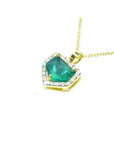 1.75 ct Colombian emerald pendant with diamond halo on a 14K gold chain.