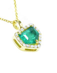 Gold necklace with a genuine colombian emerald pendant on a topside and gallery view.