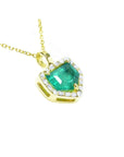 Gold necklace with a genuine colombian emerald pendant on a topside and gallery view.