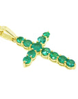 A 18k yellow gold emerald cross pendant necklace displaying a topside view and gallery profile.