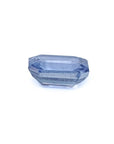 Genuine loose sapphire medium light blue emerald-cut, underside view girdle and pavilion visibles