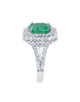 4.14 ct GIA-certified F1 Colombian emerald ring with diamond halo and split shank in 14K white gold.