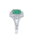 4.14 ct GIA-certified F1 Colombian emerald ring with diamond halo and split shank in 14K white gold.