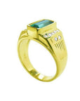 Men's 14K yellow gold ring with a bezel-set rectangular Colombian emerald and burnish-set diamonds.