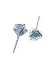 Pair of 0.74 ct round emerald stud earrings in 14K white gold with hexagonal diamond halo.