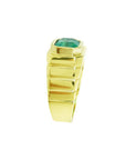 Men's 18K yellow gold ring with a rectangular, medium-deep green emerald in a full bezel setting.