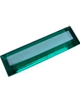 3.13 carat baguette cut Colombian emerald with sparkling bluish-green color.