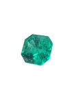 GIA certified emerald-cut loose Muzo Colombian emerald left side view