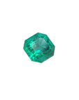 GIA certified 1.40 carat emerald-cut Colombian emerald with sparkling bluish medium-deep green color.