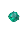 GIA certified 1.40 carat emerald-cut Colombian emerald with sparkling bluish medium-deep green color.