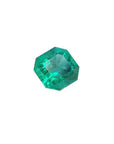 GIA certified 1.40 carat emerald-cut Colombian emerald with sparkling bluish medium-deep green color.