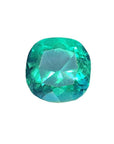 Cushion cut loose natural Colombian emerald GIA certified, displays a vibrant medium-deep bluish-green hue.