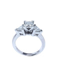 14K white gold ring with a princess cut diamond center and two trillion side diamonds.