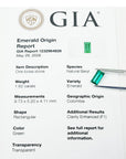 GIA emerald origin report with a green gemstone held by tweezers.