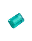 GIA certified 2.47 carat loose Colombian emerald, sparkling bluish-green, rectangular cut.