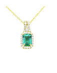 From Muzo mines Natural Colombian emerald necklace halo diamond crafted in 14k yellow gold