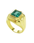 18K yellow gold men's solitaire ring with a square emerald cut, medium green Muzo Colombian emerald in a full bezel setting.
