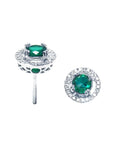 Pair of 14k white gold halo diamond emerald stud earrings, downside and top view positions.