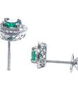 Pair of earrings in white gold with underside view screw back systems.