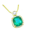 Natural emerald necklace 8.07 carats encircled in a halo of natural diamonds 18k yellow gold.