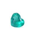 Heart-shaped emerald gemstone front let side looking at table and crown's gem