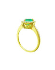 14K yellow gold heart-cut emerald engagement ring with diamond halo and pavé band.