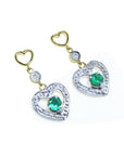 Pair of emerald heart earrings with round cut emeralds in 14k yellow gold.