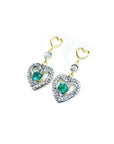 14K yellow gold heart earrings with brilliant cut Colombian emeralds and diamond accents.
