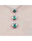 Round cut natural emeralds journey necklace heart pendant.