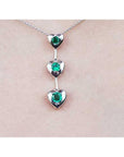 Round cut natural emeralds journey necklace heart pendant.