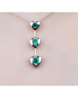 Round cut natural emeralds journey necklace heart pendant.
