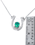 May's birthstone emerald horseshoe necklace for women with natural diamonds, 14k white gold, a lucky piece to wear every day