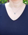 women's Horseshoe natural emerald necklace with natural diamonds, crafted in 14k white gold, a lucky piece of jewelry to wear every day
