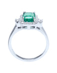 This image shows an affordable emerald engagement ring shows the top, gallery and band design.