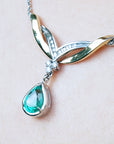 May's birthstone necklace for women emerald 1.88 carats pear cut natural from the Muzo mines in 14k white and yellow gold