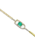 14K yellow gold bracelet with a vibrant green emerald-cut Colombian emerald and diamond accents.