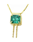 Natural emerald necklace Lariat style set in 14k yellow gold sourced from the Muzo mines in Colombia weighing 1.48 carats