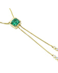 Genuine emerald lariat necklace set in 14k yellow gold fine emerald-cut sourced from the Muzo mines in Colombia