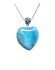 Larimar blue heart-shaped silver pendant necklace on a white background