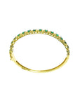 14K gold bangle bracelet with round cut bluish-green emeralds in square links with rope borders.